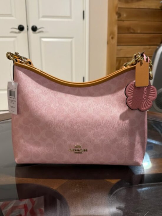 Coach Handbags - NWT Coach Gold/Powder Pink Laurel Shoulder Bag With Charms CEL12
